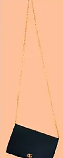 Black mini bag suspended on a fine gold chain